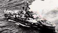 The US Navy Beached the 27,500-Ton Battleship USS Nevada at Pearl Harbor After 6 Bomb Hits and 1 Torpedo. She Was Repaired, Shelled Normandy on D-Day, Survived 2 Atomic Bombs at Bikini, Then Took 5 Days of Naval Gunfire Before 1 Aerial Torpedo Finally…