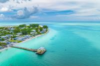 This Underrated Florida Island With 78°F Winters, Turquoise Gulf Water, And Zero High-Rise Hotels Is Breaking Tourism Records