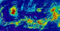 Storm spares Guam, heads toward Japan