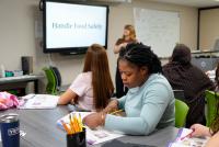 Hundreds of immigrants, refugees await English education as Literacy Green Bay weathers federal cuts