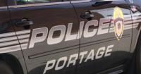 High school student arrested after bringing gun to Portage football game