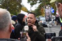 UK anti-migrant activist arrested for suspected criminal damage and endangerment