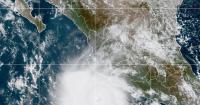 Powerful Hurricane Polo drenches Mexico's coast as Nolo takes aim at Hawaii