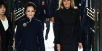 Melania Trump hosts China's first lady for an outing that is watched for diplomacy and style