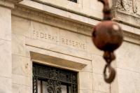 U.S. Fed officials see rates likely rising to curb high inflation