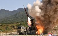 N. Korea carries out test launch of upgraded multiple-rocket launcher shells