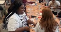 Students pack the dining room for One Smart Cookie