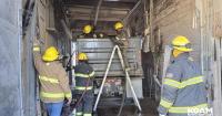 Piqua in southeast Kansas evacuated as crews battle smoldering grain bin fire