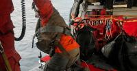 Pilot rescued after military plane crashes off Central Coast