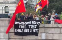Chinese supporters attack Tibetan, other protesters as President Xi lands in US for state visit