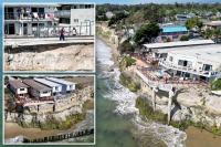 California students living in precarious housing hanging off a cliff — as monster hurricane barrels in