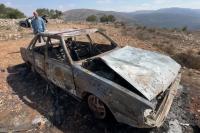 Israeli settlers burn Palestinian vehicles, spray racist slogans near Ramallah