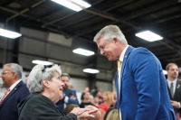 Rush of money, campaign stops show Republicans feel vulnerable in Iowa, Kansas