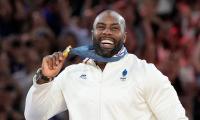 Black French judo star is bombarded with racist abuse sparking police probe after saying he was 'freaked out' by rise of the hard-right