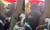 Afghan women are rounded up and dragged into a van by female Taliban morality police in latest brutal crackdown