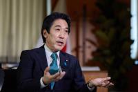 Japan growth minister says economy has exited reflationary phase