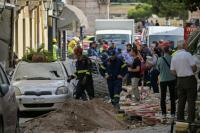 World AFP Six missing after building blast in historic Athens district