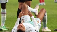 France's Mbappe forced off with apparent knee injury in Turkey clash