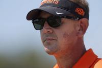 Oklahoma State coach Eric Morris says he shot armadillo tearing up his lawn