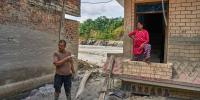 A month after Nepal floods, thousands are still missing and families face a long recovery