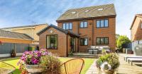 Take a look around 'impressive' six-bed family home for sale in Wrexham village