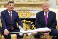 Trump, Xi agree to establish AI communication channel, oppose tolls on int'l waterways: White House