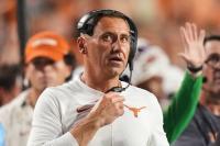 Trump attends Texas-Tennessee game with no apparent disruption to coaches' communications