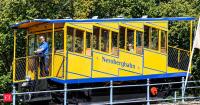 In 1888, a German city built a railway that climbs without an onboard engine: 1,849 gallons of water weigh one car down enough to pull the other 272 feet uphill