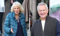 I can't bear bumping into you! Queen Camilla attends book festival alongside Paddington star Hugh Bonneville