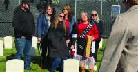 Hoping to bring ancestors home, families travel cross country