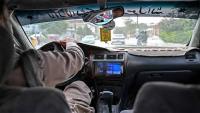 Afghan taxi drivers turn up the music, defying Taliban ban