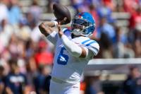 Ole Miss QB Trinidad Chambliss injures his left thigh at No. 21 Florida but returns to game