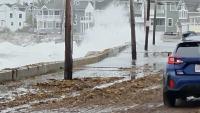 Car damaged as large surf from nor'easter pounds Maine coast