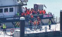 'Russian arrival' among migrants who reached British shores last week sparks spying fears