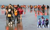 French charity workers accused of 'assisting trafficking' as volunteers help child migrants attempt to cross the Channel
