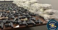Michigan officers seize 174 guns, suspected heroin during traffic stop
