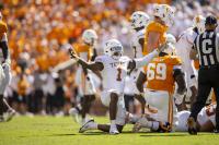Texas overcomes unconventional penalties to take Tennessee down on the road