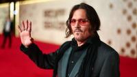 Johnny Depp bites into decorative plant in unexpected Las Vegas party appearance