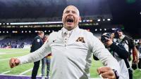 Minnesota coach PJ Fleck wipes player's blood all over his face after Gophers win over Washington