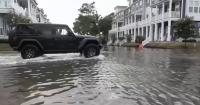DC area battered by gusty winds, coastal flooding as nor'easter churns north