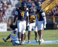 Aggies upset No. 19 Rhode Island in first win. What made the difference?