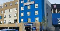Travelodge guest who died in room was struggling with debt