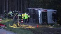 Two dead & 19 injured after bus carrying dozens of tourists to Oktoberfest party crashes in Germany as driver detained