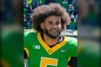 Oregon QB Dante Moore Stretchered Off After Brutal Hit in USC Win