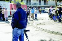 Gunmen kill 27 in two South Africa mass