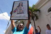 Venezuelans rally to demand opposition leader’s safe return and presidential elections