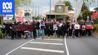 Marchers condemn violence, remember lost community members