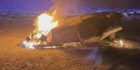 Lyon County Fire crews discover an overturned car on fire