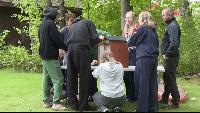 German high school students help install Little Free Library at Bayside Park in Acme