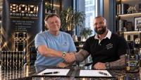Alex Bodi and Prof. Dr Dieter Lazik sign a contract for ALPHA WHEY and BODI Energy Drink